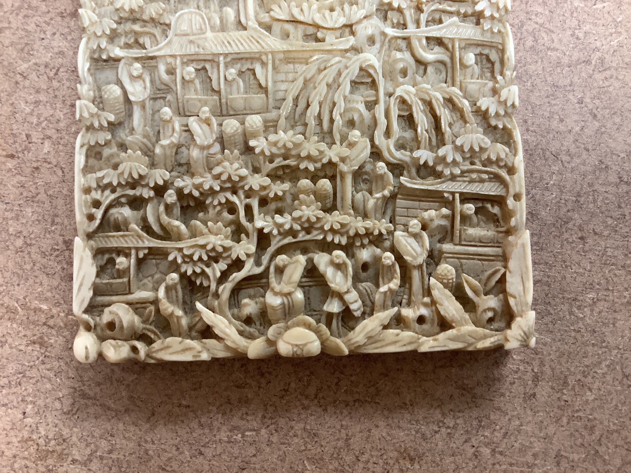 A Chinese Cantonese carved ivory card case, 11.5cm